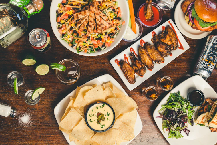 A spread of plated dishes ready for pickup